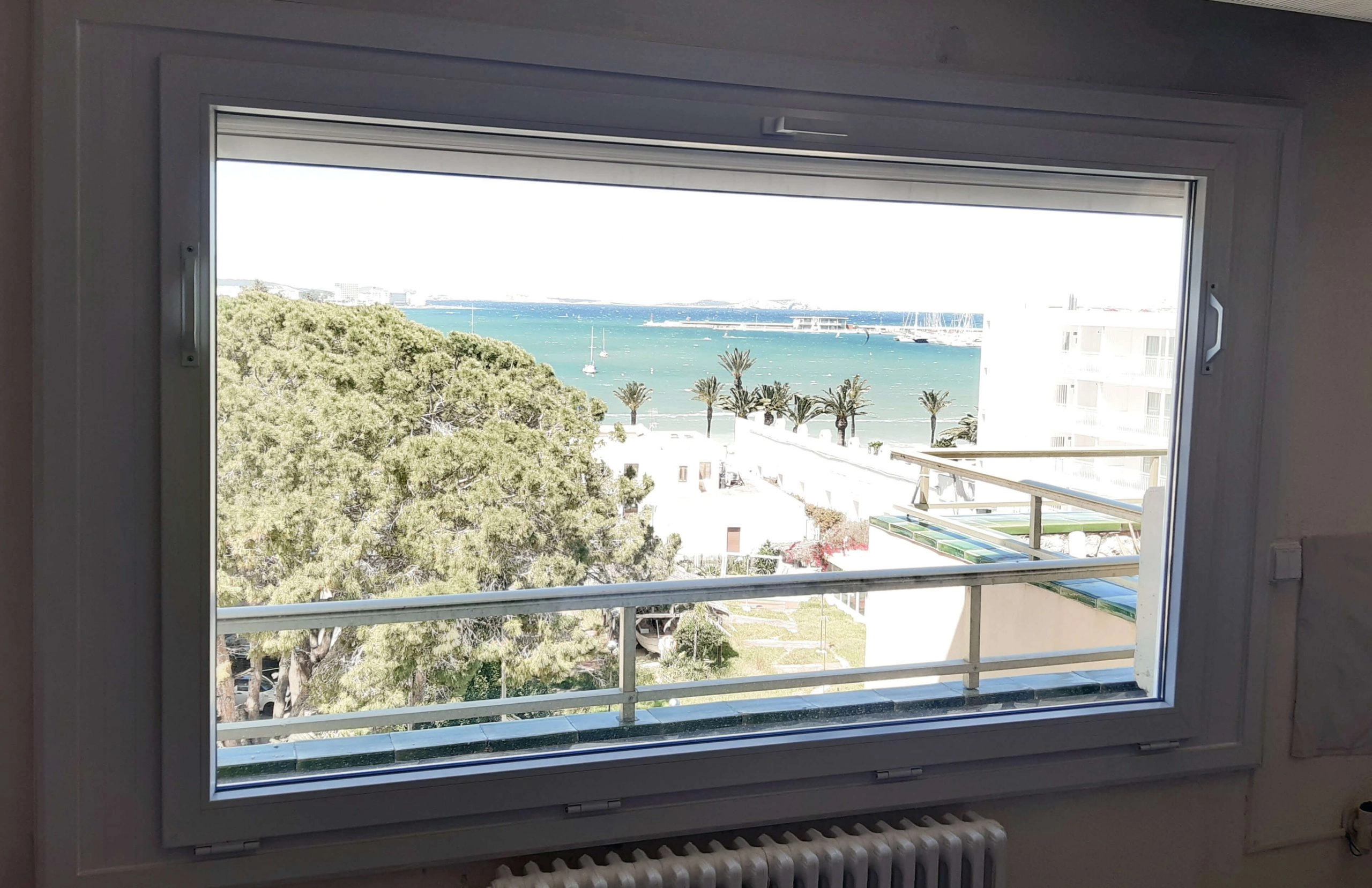 Home 9 Ventana panorámica fija con vistas a la playa